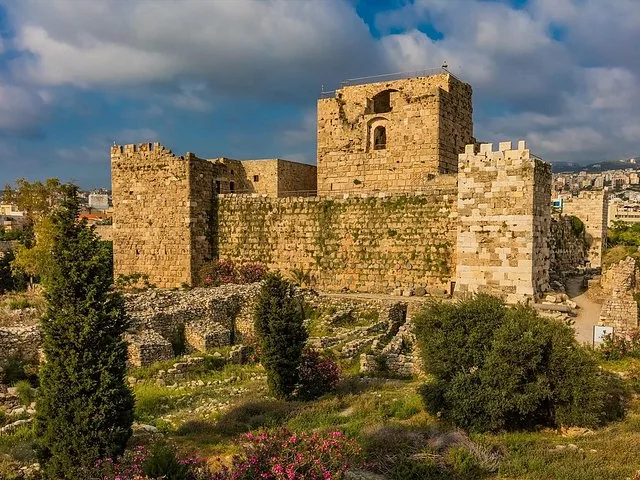 Stone ruins of an ancient castle overlooking a valley